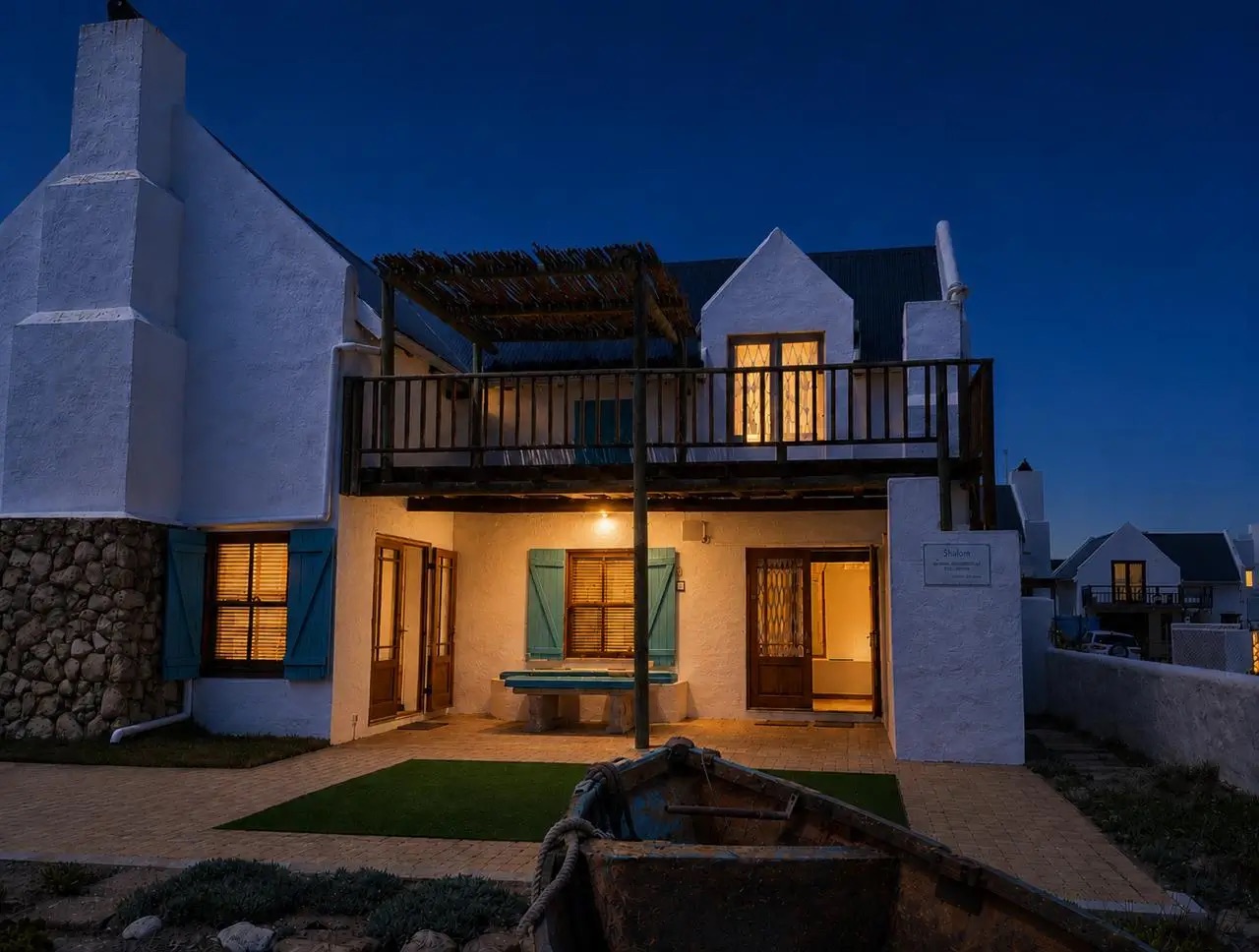 Front of Shalom Beach House at night